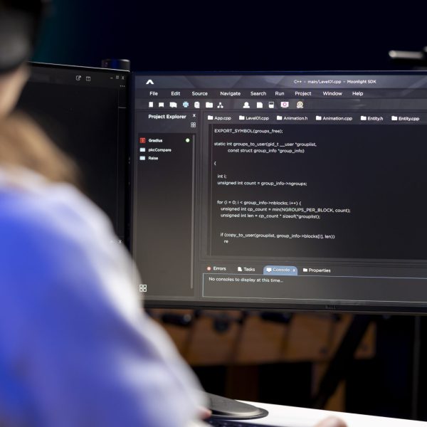 Freelancing developer hearing audiobooks while designing and developing software applications. IT expert enjoying podcasts while implementing and maintaining company systems